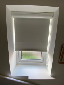 A cassette blackout roller blind fitted in a hall in Ipswich