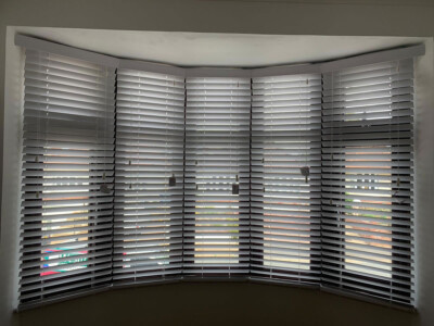 Faux wooden Venetians installed to a bay window in Ipswich