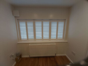 Wooden shutters fitted on a home in Ipswich