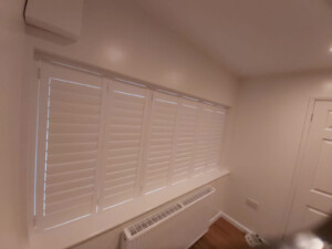 Wooden shutters fitted on a home in Ipswich