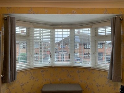 Venetian blinds in a bay window