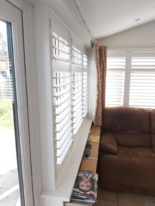Wooden shutters in garden room in Woodbridge