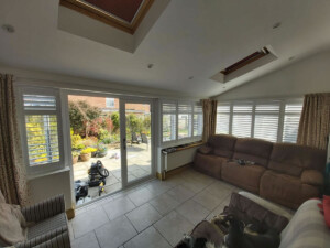 Wooden shutters in garden room in Woodbridge