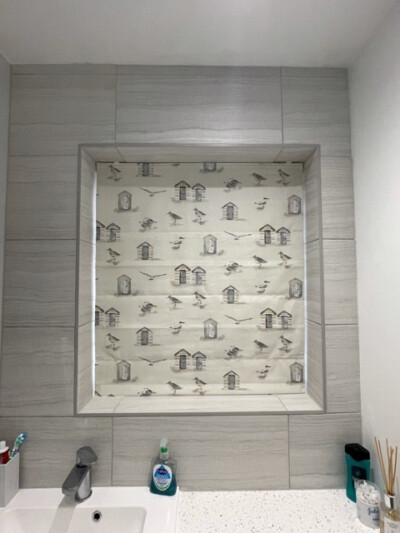 Patterned bathroom roman blind